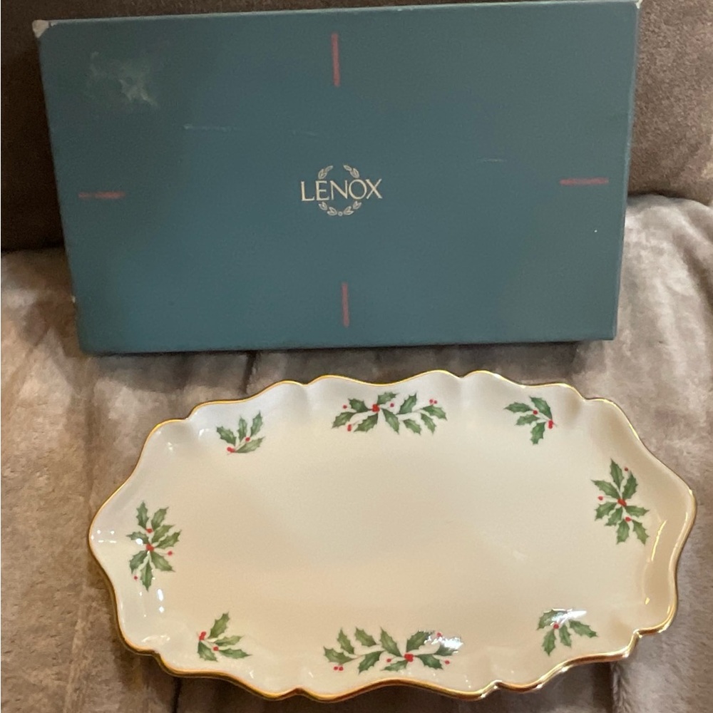 Lenox: China holiday medium scalloped Christmas serving tray with holly berries.